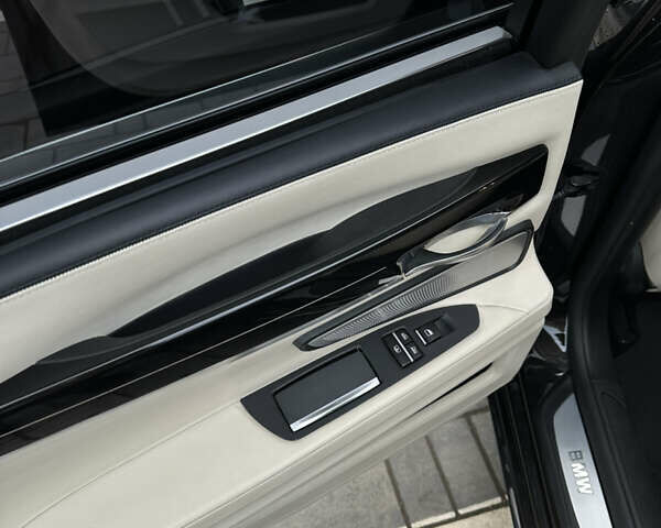 Черный БМВ 7 Серия, объемом двигателя 2.99 л и пробегом 275 тыс. км за 23500 $, фото 39 на Automoto.ua