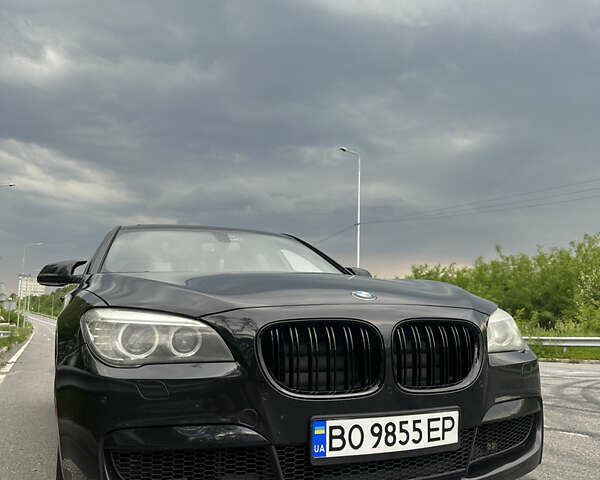 Черный БМВ 7 Серия, объемом двигателя 3 л и пробегом 240 тыс. км за 13500 $, фото 1 на Automoto.ua