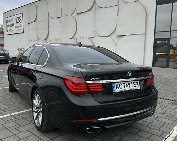 Черный БМВ 7 Серия, объемом двигателя 2.99 л и пробегом 275 тыс. км за 23500 $, фото 11 на Automoto.ua