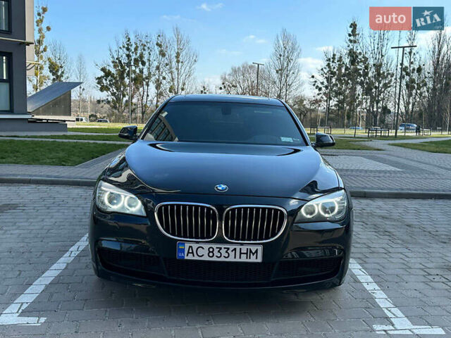 Черный БМВ 7 Серия, объемом двигателя 2.98 л и пробегом 245 тыс. км за 14000 $, фото 1 на Automoto.ua