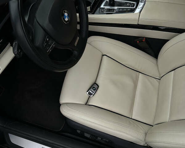 Черный БМВ 7 Серия, объемом двигателя 2.99 л и пробегом 275 тыс. км за 23500 $, фото 18 на Automoto.ua