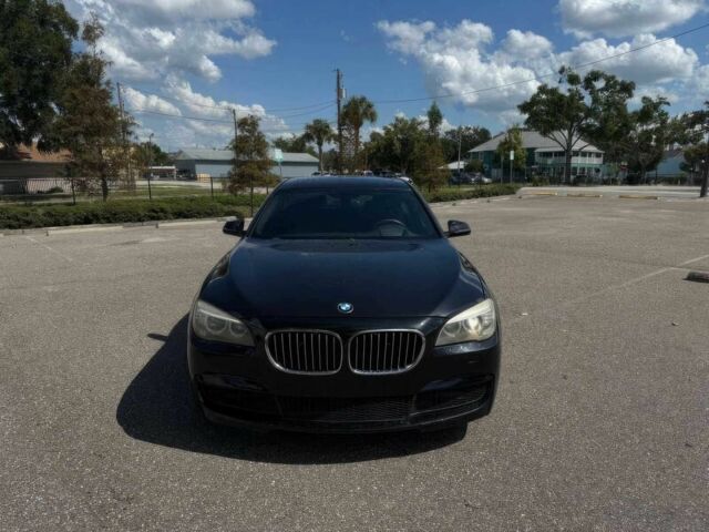Черный БМВ 7 Серия, объемом двигателя 3 л и пробегом 80 тыс. км за 4400 $, фото 1 на Automoto.ua