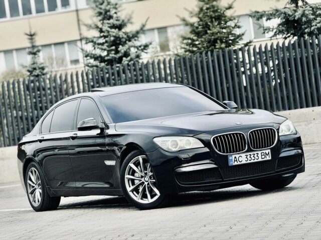 Черный БМВ 7 Серия, объемом двигателя 3 л и пробегом 250 тыс. км за 14000 $, фото 1 на Automoto.ua