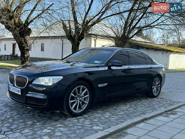Черный БМВ 7 Серия, объемом двигателя 2.98 л и пробегом 250 тыс. км за 16800 $, фото 2 на Automoto.ua