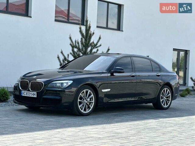 Черный БМВ 7 Серия, объемом двигателя 2.98 л и пробегом 245 тыс. км за 14000 $, фото 4 на Automoto.ua