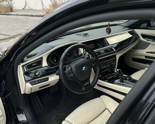 Черный БМВ 7 Серия, объемом двигателя 2.99 л и пробегом 275 тыс. км за 23500 $, фото 12 на Automoto.ua
