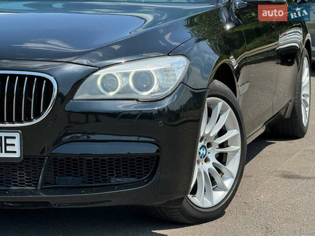 Черный БМВ 7 Серия, объемом двигателя 2.98 л и пробегом 143 тыс. км за 19000 $, фото 6 на Automoto.ua