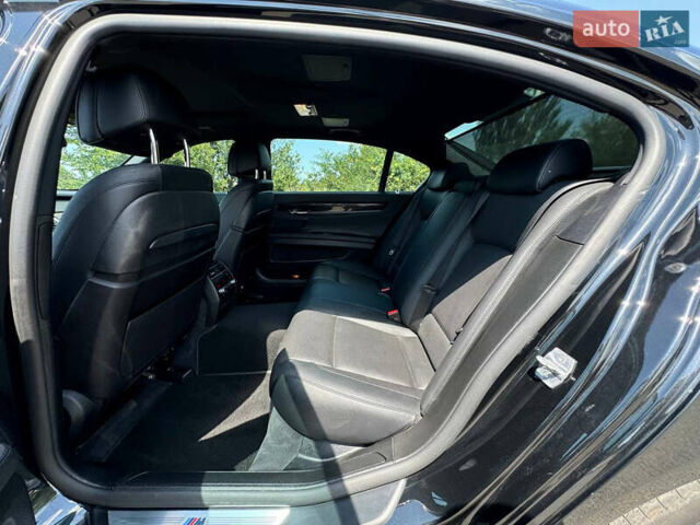 Черный БМВ 7 Серия, объемом двигателя 2.98 л и пробегом 143 тыс. км за 19000 $, фото 13 на Automoto.ua