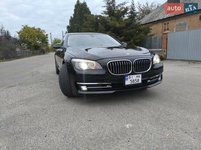 Черный БМВ 7 Серия, объемом двигателя 2.98 л и пробегом 130 тыс. км за 20900 $, фото 7 на Automoto.ua