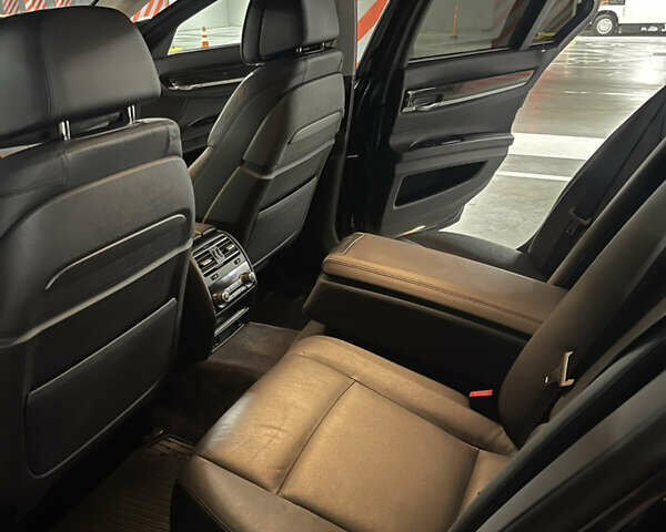 Черный БМВ 7 Серия, объемом двигателя 2.99 л и пробегом 172 тыс. км за 26900 $, фото 9 на Automoto.ua