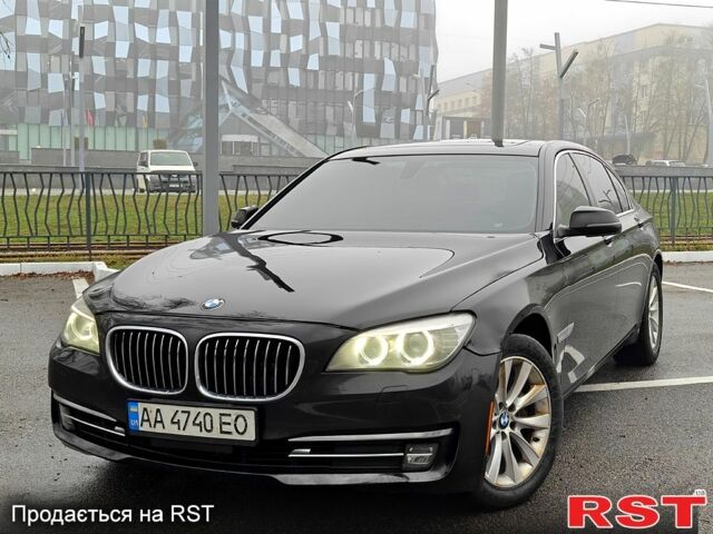 Черный БМВ 7 Серия, объемом двигателя 3 л и пробегом 200 тыс. км за 15500 $, фото 1 на Automoto.ua