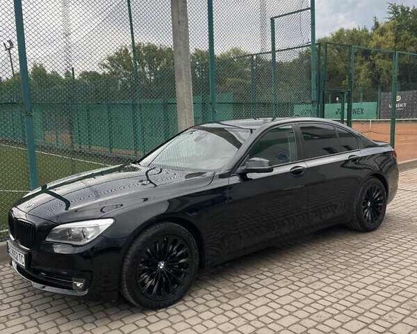 Черный БМВ 7 Серия, объемом двигателя 2.99 л и пробегом 172 тыс. км за 26900 $, фото 1 на Automoto.ua