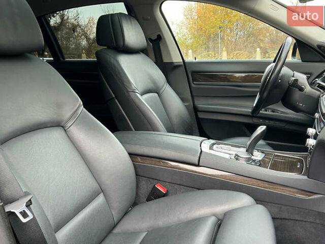 Черный БМВ 7 Серия, объемом двигателя 2.99 л и пробегом 173 тыс. км за 25200 $, фото 25 на Automoto.ua