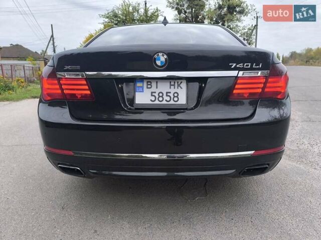 Черный БМВ 7 Серия, объемом двигателя 2.98 л и пробегом 130 тыс. км за 20900 $, фото 1 на Automoto.ua