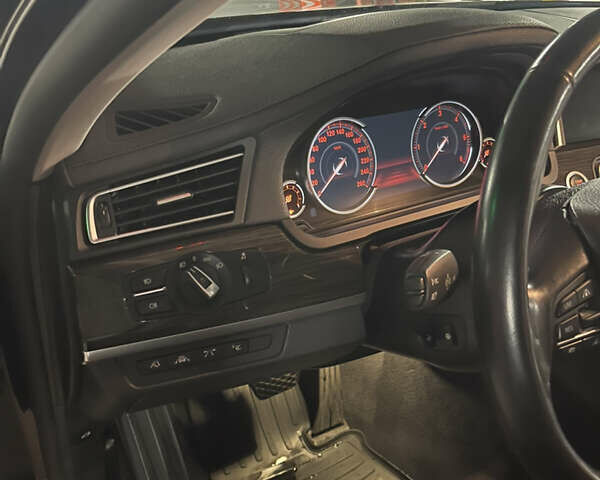 Черный БМВ 7 Серия, объемом двигателя 2.99 л и пробегом 172 тыс. км за 26900 $, фото 6 на Automoto.ua