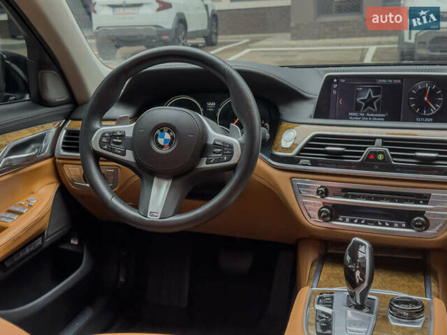 Черный БМВ 7 Серия, объемом двигателя 4.4 л и пробегом 185 тыс. км за 24700 $, фото 27 на Automoto.ua