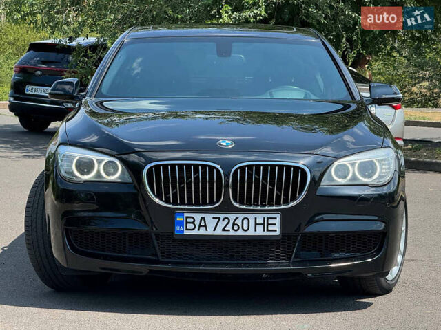 Черный БМВ 7 Серия, объемом двигателя 2.98 л и пробегом 143 тыс. км за 19000 $, фото 2 на Automoto.ua