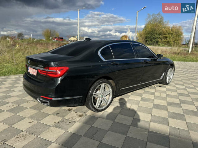 Черный БМВ 7 Серия, объемом двигателя 3 л и пробегом 142 тыс. км за 27000 $, фото 5 на Automoto.ua
