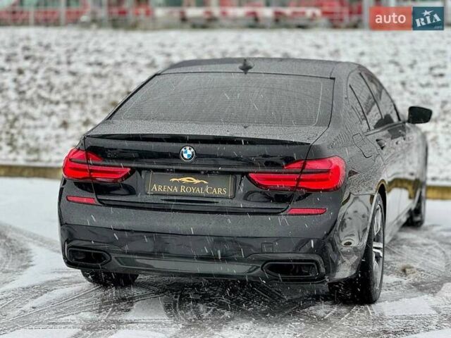 Черный БМВ 7 Серия, объемом двигателя 2.99 л и пробегом 186 тыс. км за 34500 $, фото 22 на Automoto.ua