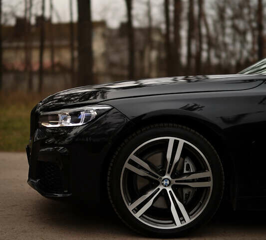 Черный БМВ 7 Серия, объемом двигателя 2.99 л и пробегом 138 тыс. км за 38700 $, фото 1 на Automoto.ua