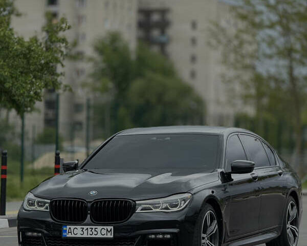 Черный БМВ 7 Серия, объемом двигателя 4.39 л и пробегом 190 тыс. км за 31000 $, фото 1 на Automoto.ua