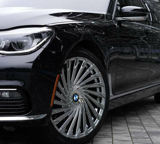 Черный БМВ 7 Серия, объемом двигателя 3 л и пробегом 165 тыс. км за 28000 $, фото 3 на Automoto.ua