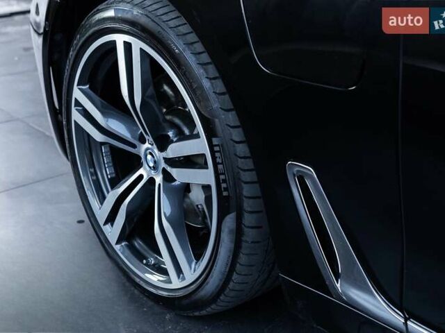 Черный БМВ 7 Серия, объемом двигателя 2 л и пробегом 110 тыс. км за 35000 $, фото 2 на Automoto.ua