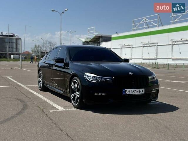 Черный БМВ 7 Серия, объемом двигателя 2.98 л и пробегом 125 тыс. км за 34500 $, фото 1 на Automoto.ua