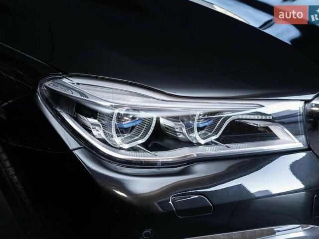 Черный БМВ 7 Серия, объемом двигателя 2 л и пробегом 110 тыс. км за 35000 $, фото 1 на Automoto.ua