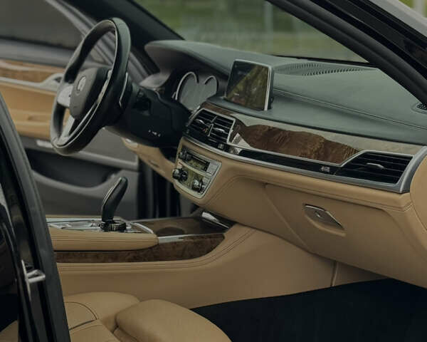 Черный БМВ 7 Серия, объемом двигателя 4.39 л и пробегом 190 тыс. км за 31000 $, фото 18 на Automoto.ua