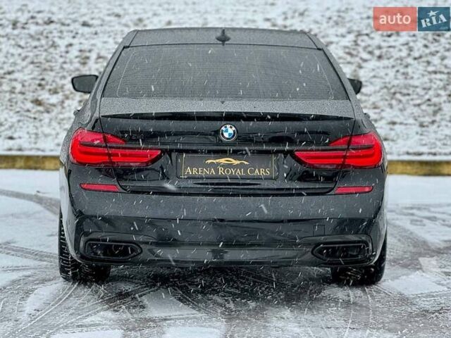 Черный БМВ 7 Серия, объемом двигателя 2.99 л и пробегом 186 тыс. км за 34500 $, фото 20 на Automoto.ua