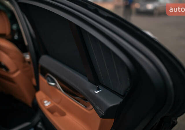 Черный БМВ 7 Серия, объемом двигателя 2.99 л и пробегом 243 тыс. км за 39000 $, фото 42 на Automoto.ua