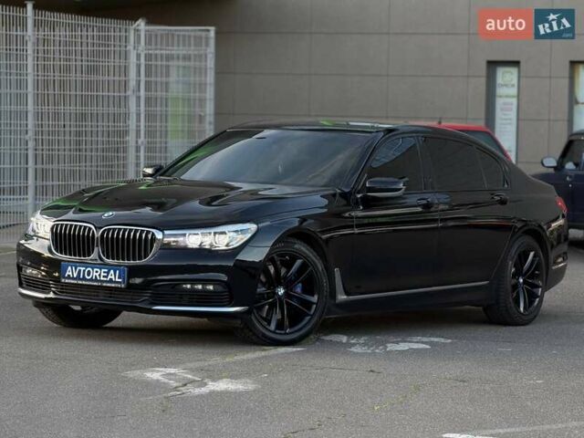 Черный БМВ 7 Серия, объемом двигателя 3 л и пробегом 130 тыс. км за 29000 $, фото 1 на Automoto.ua
