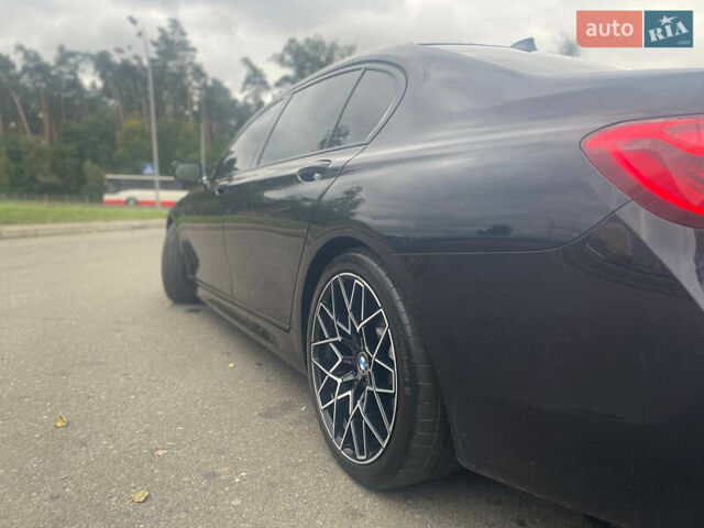 Черный БМВ 7 Серия, объемом двигателя 2.99 л и пробегом 183 тыс. км за 38900 $, фото 15 на Automoto.ua