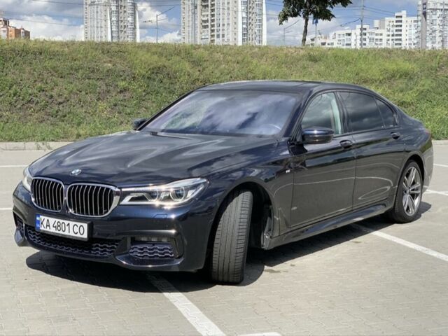 Черный БМВ 7 Серия, объемом двигателя 4.4 л и пробегом 135 тыс. км за 42500 $, фото 1 на Automoto.ua