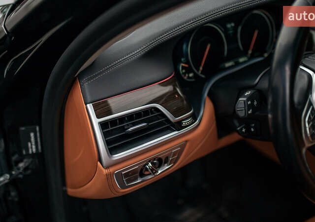 Черный БМВ 7 Серия, объемом двигателя 2.99 л и пробегом 243 тыс. км за 39000 $, фото 102 на Automoto.ua