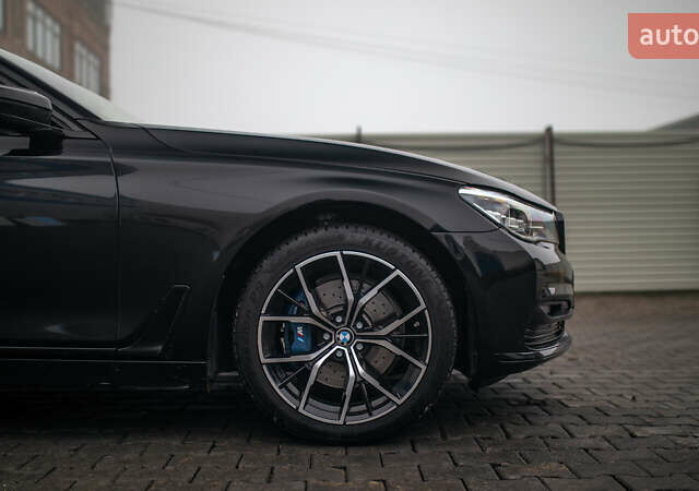 Черный БМВ 7 Серия, объемом двигателя 2.99 л и пробегом 243 тыс. км за 39000 $, фото 18 на Automoto.ua