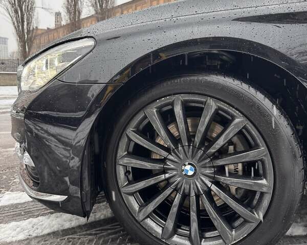 Чорний БМВ 7 Серія, об'ємом двигуна 2 л та пробігом 143 тис. км за 35000 $, фото 70 на Automoto.ua