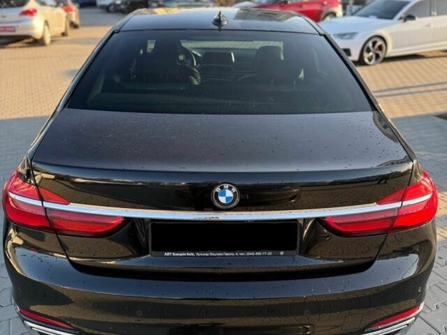 Черный БМВ 7 Серия, объемом двигателя 3 л и пробегом 117 тыс. км за 45000 $, фото 1 на Automoto.ua