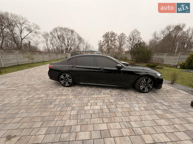 Чорний БМВ 7 Серія, об'ємом двигуна 3 л та пробігом 179 тис. км за 35000 $, фото 5 на Automoto.ua