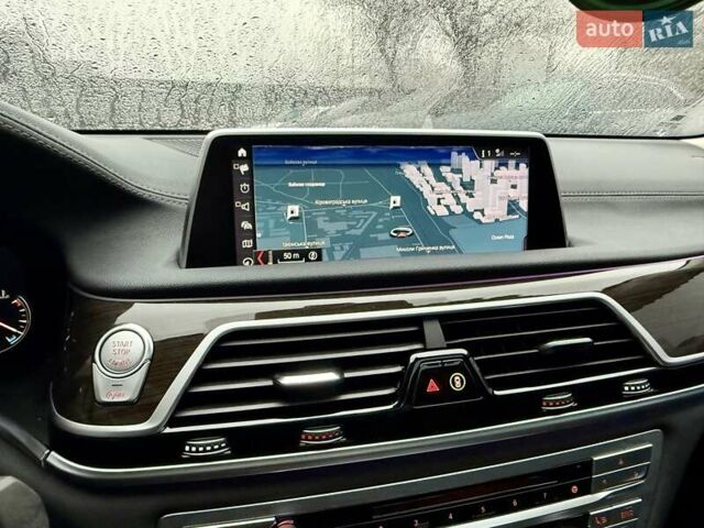 Черный БМВ 7 Серия, объемом двигателя 2.99 л и пробегом 102 тыс. км за 35900 $, фото 42 на Automoto.ua