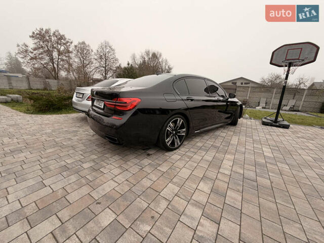 Чорний БМВ 7 Серія, об'ємом двигуна 3 л та пробігом 179 тис. км за 35000 $, фото 6 на Automoto.ua