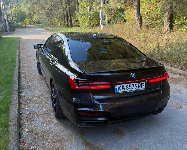 Черный БМВ 7 Серия, объемом двигателя 3 л и пробегом 80 тыс. км за 39500 $, фото 4 на Automoto.ua