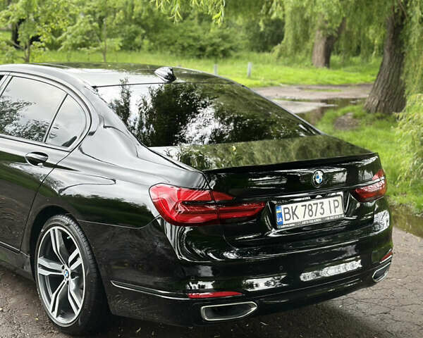 Черный БМВ 7 Серия, объемом двигателя 2.98 л и пробегом 160 тыс. км за 30000 $, фото 1 на Automoto.ua