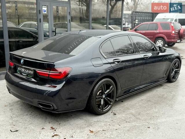 Черный БМВ 7 Серия, объемом двигателя 2.99 л и пробегом 102 тыс. км за 35900 $, фото 6 на Automoto.ua