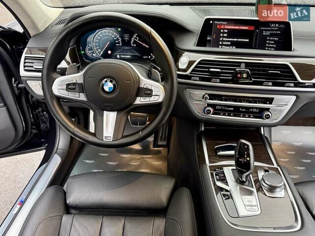 Черный БМВ 7 Серия, объемом двигателя 2.99 л и пробегом 102 тыс. км за 35900 $, фото 46 на Automoto.ua