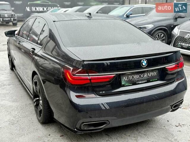 Черный БМВ 7 Серия, объемом двигателя 2.99 л и пробегом 102 тыс. км за 35900 $, фото 9 на Automoto.ua