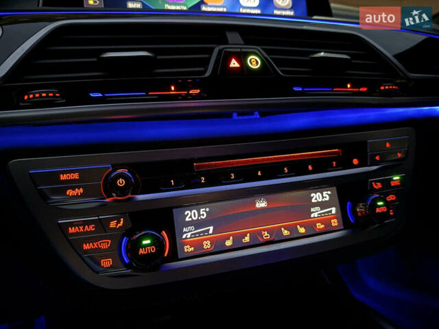 Черный БМВ 7 Серия, объемом двигателя 3 л и пробегом 107 тыс. км за 74950 $, фото 63 на Automoto.ua