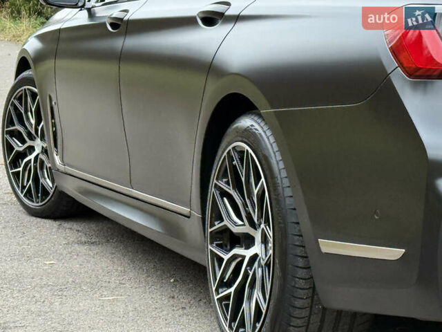 Черный БМВ 7 Серия, объемом двигателя 3 л и пробегом 107 тыс. км за 74950 $, фото 136 на Automoto.ua