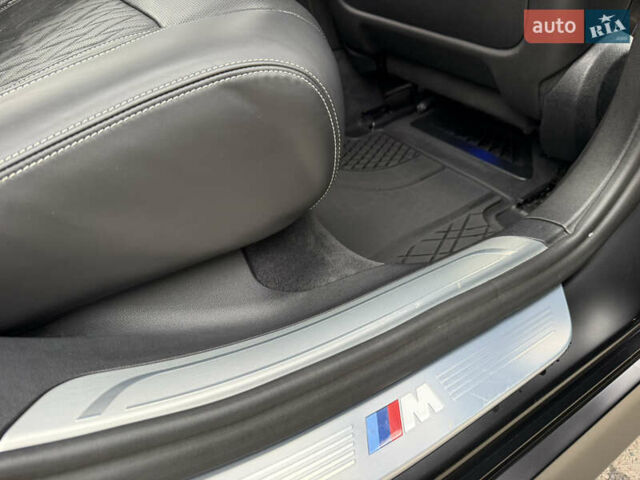 Черный БМВ 7 Серия, объемом двигателя 3 л и пробегом 107 тыс. км за 74950 $, фото 102 на Automoto.ua